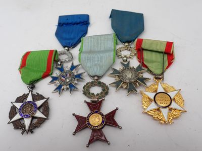 a close up of a group of medals on a table