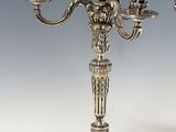 pair of antique silver plated candelabs with angels on them
