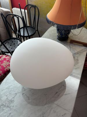 a lamp that is sitting on a table in a living room
