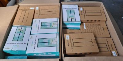 several boxes of electronic devices are stacked on top of each other