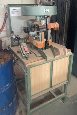 a machine that is sitting on a table in a garage