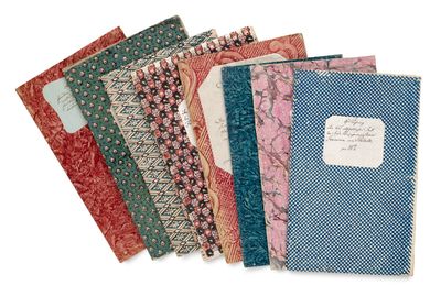 a set of five notebooks with different patterns on them