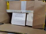 a cardboard box that has two packages on top of it