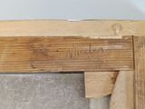 a close up of a piece of wood on the floor