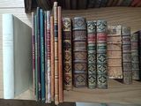 many books that are on a shelf together