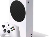 microsoft ' s new white xbox pro console with a wireless controller
