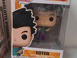 funko pop vinyl figure of a cartoon character in a box next to a pop vinyl figure of a cartoon character in a box