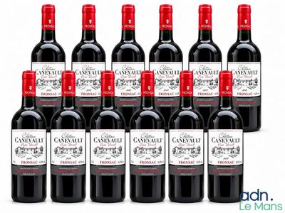 un lot de bouteilles de vin rouge alignées les unes à côté des autres