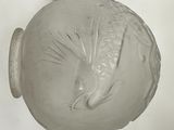 an image of a wall light with a bird on it