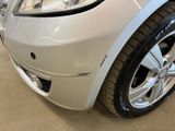 a close up of a car ' s headlight and front bumper