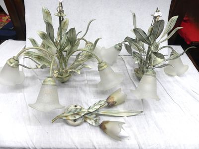 three vases that have plants in them on a table