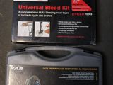 two boxes of universal bleed kit on a table