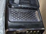 a box with a computer and a keyboard inside of it