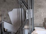 an image of a dirty room with a bucket of cement