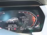 a car dashboard with a speedometer and other information on it