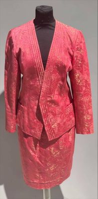 pink jacket and skirt suit on a mannequin mannequin mannequin mannequin mannequin mannequin mannequin mannequin mann
