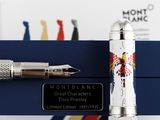 a fountain pen sitting on top of a blue box