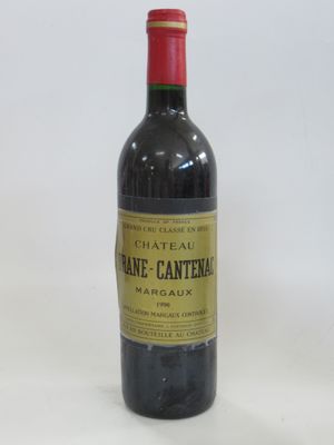 a bottle of wine that is sitting on a table