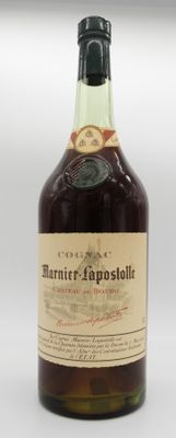 an image of a bottle of brandy sitting on top of a table