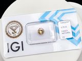 a small diamond in the package on a plate
