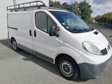 a white van that is parked in a parking lot