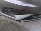 a close up of the front bumper of a car