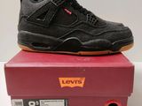 a close up of a pair of shoes on top of a box
