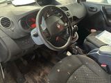 a dirty car that is parked in a lot