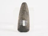 a rock with a tag on it sitting on a white surface