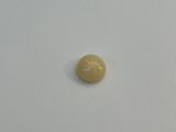 yellow opal stone on a white surface with a white background