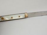 a knife that is sitting on a table