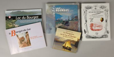 four books that are sitting on a table