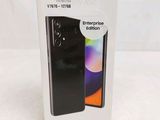 the box of the samsung galaxy s20 is open on a white surface