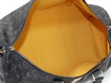 the inside of a louis vuitton bag with a yellow lining