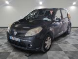 a picture of a small black car parked in a garage