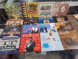 a lot of books that are on a table