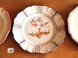 three plates that are sitting on a table