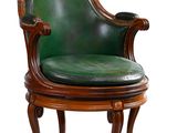 an image of a green leather chair on a white background