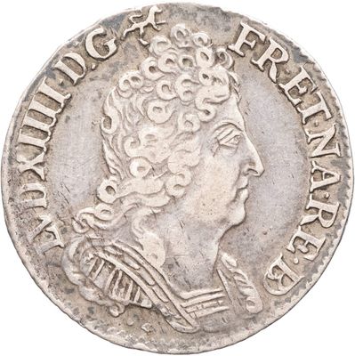 une pièce d'argent portant une tête de femme et une couronne