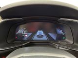 the dashboard of a car with a digital display on it