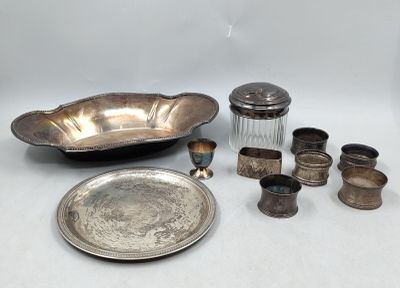 silver plate and silverware on a white background