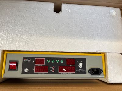 an image of a close up of a box with a clock on it