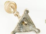 pair of antique brass door handles with a triangle and eye of providence
