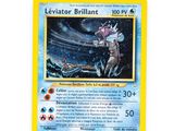 a close up of a pokemon card on a white surface