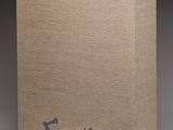 an image of a brown book with a blue writing on it