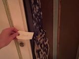 a person holding a piece of paper in their hand