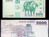 quatre billets différents, de couleurs et de formes variées, sur fond noir