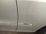 a close up of a car door handle and the door handle is missing