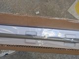 a box with a pen in it sitting on the floor
