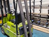 a forklift truck that is parked in a warehouse